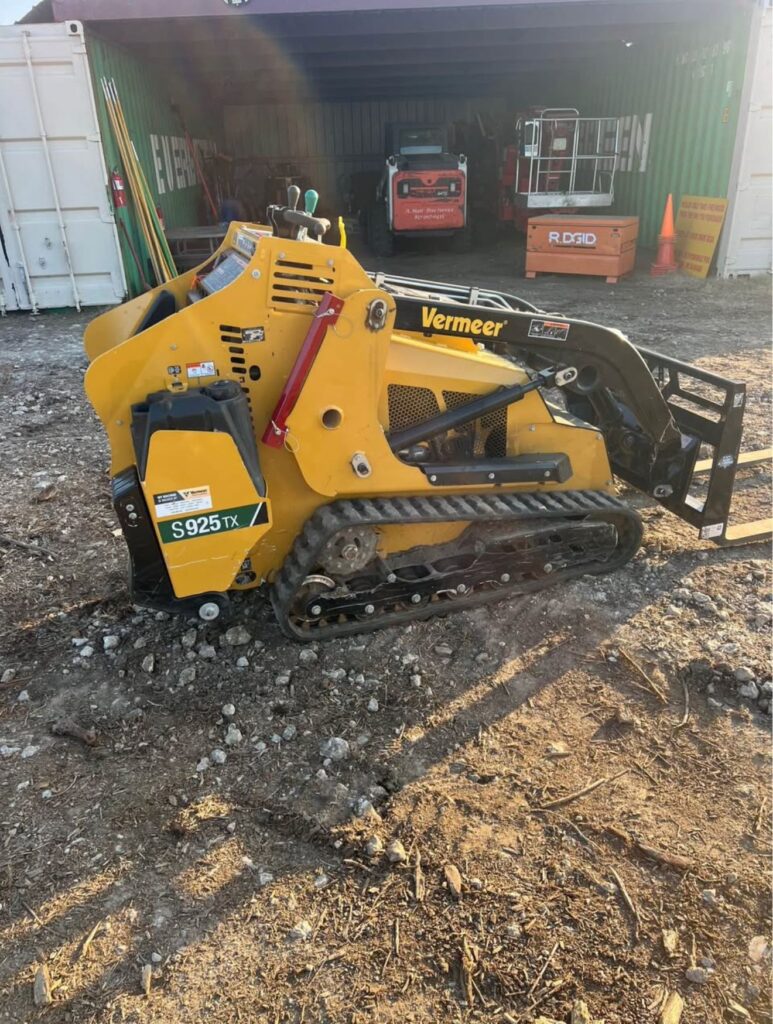 Working to remove tree stump